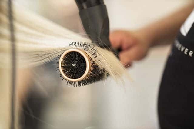 blow-drying hair