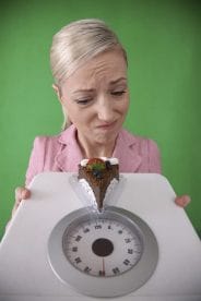 a woman holds the scales in her hands