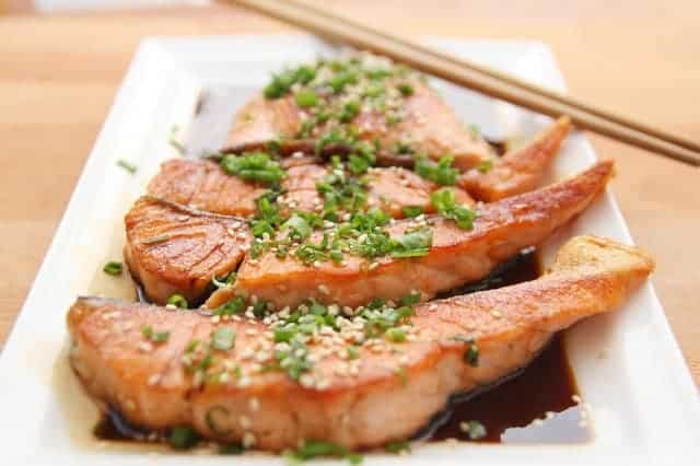 salmon on a plate sprinkled with chives