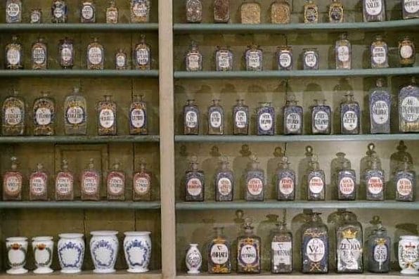 Bottled herbs on the shelf at the pharmacy