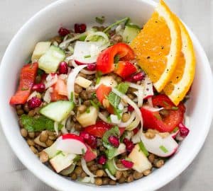 Fruit and vegetable salad with orange pieces