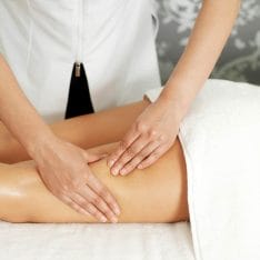 woman does a leg massage