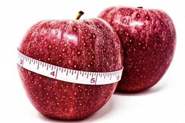 An apple tied with a centimeter, weight control