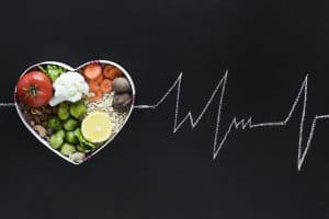 Healthy food in a heart-shaped bowl