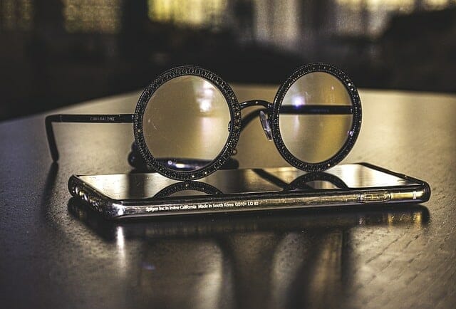 Glasses lying on the smartphone
