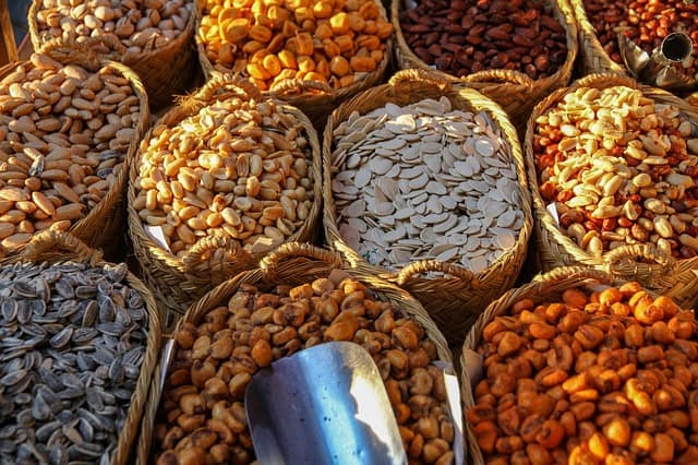 baskets with different kinds of grains and nuts