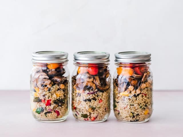 Dietetic dish of groats and vegetables in jars
