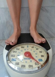 person standing on the scale