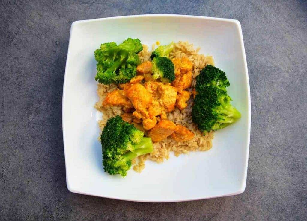 rice with chicken and broccoli on a plate