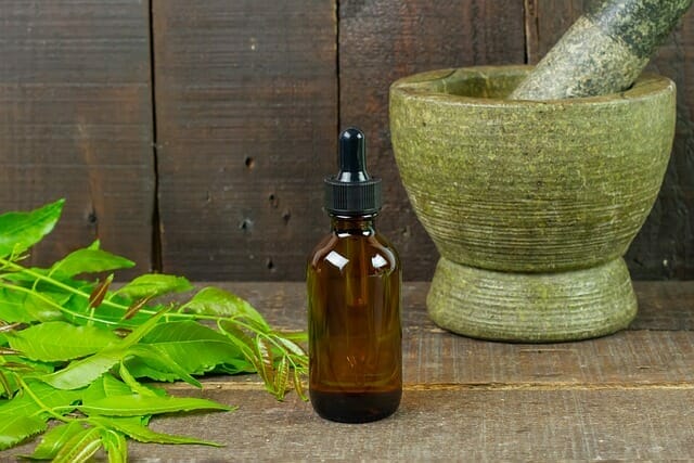 Herbs, next to the mortar and pestle