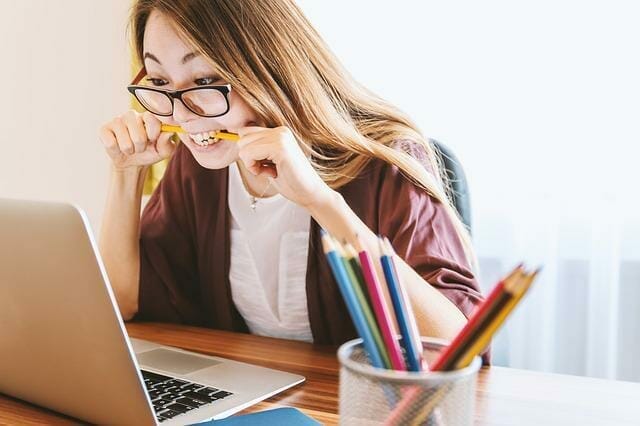  A stressed woman at the laptop