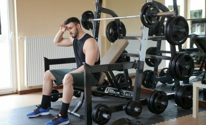  A tired man at the gym